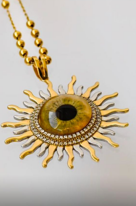 The sun 18k gold with real eyes prints and diamonds 16g length 4cm for the pendant 40cm for the necklace